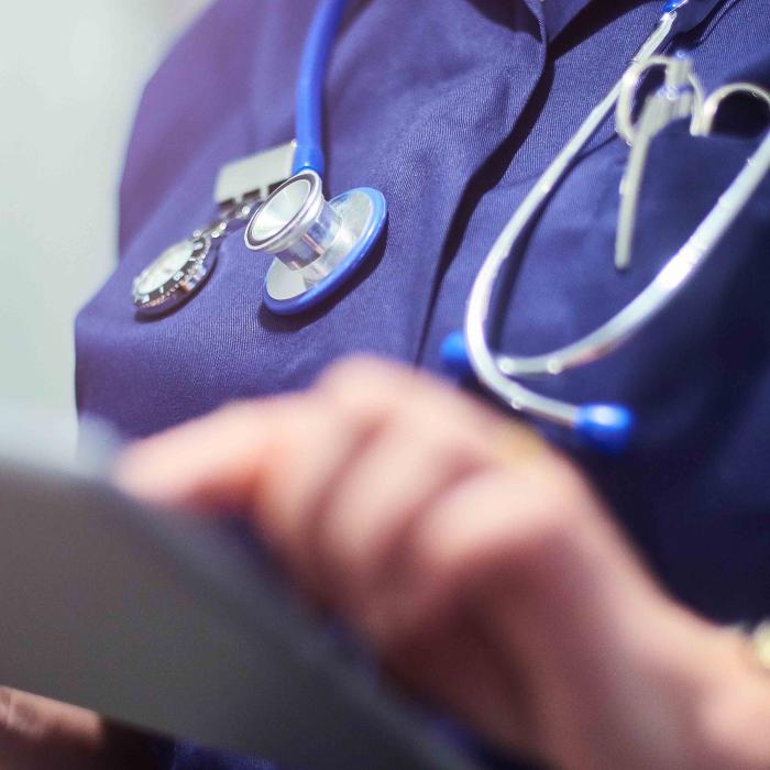 doctor using tablet