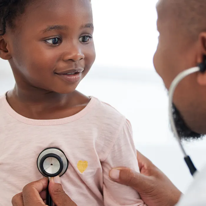child with pediatric doctor