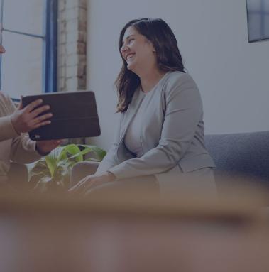 two Fathomers working on digital marketing