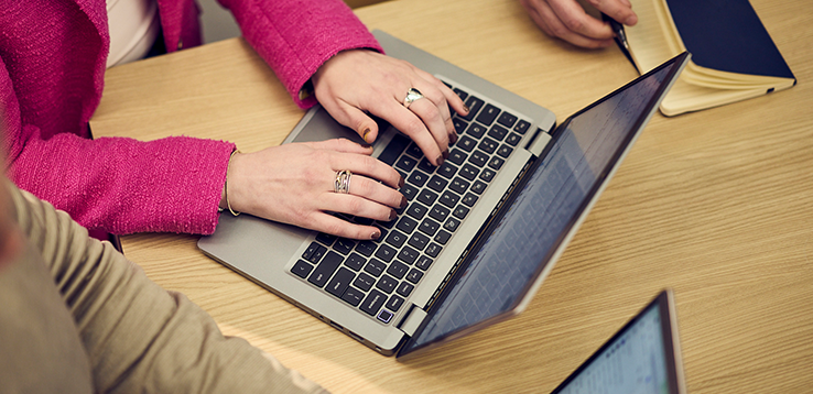 A Fathom Marketer on a laptop