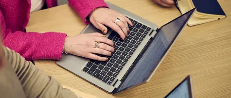A Fathom Marketer on a laptop