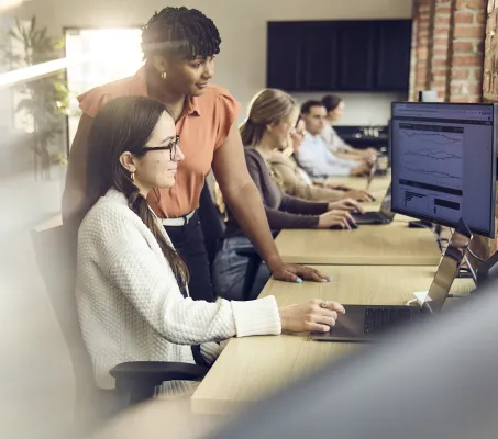 two Fathomers collaborating on digital marketing